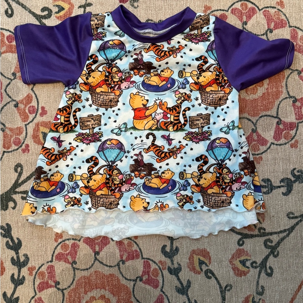 Winnie the Pooh Hi-Lo top with lettuce hem